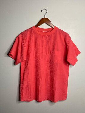 Vintage pink top with front pocket about a size medium
